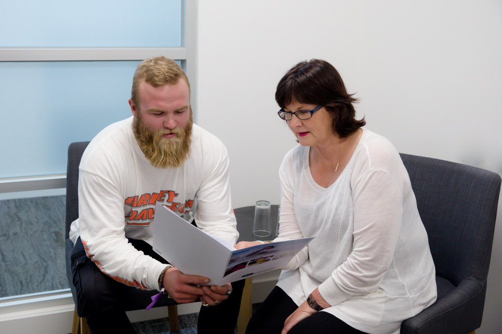 Gateways Volunteer Coordinator Toni takes our newest volunteer Ben through induction