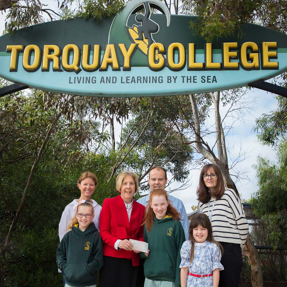 Abbey was joined by parents Kerry and Andrew, sisters Paige and Mia and Torquay College Assistant Principal Nadia Tkaczuk when she presented Gateways CEO Rosemary Malone with the money she raised through her project 