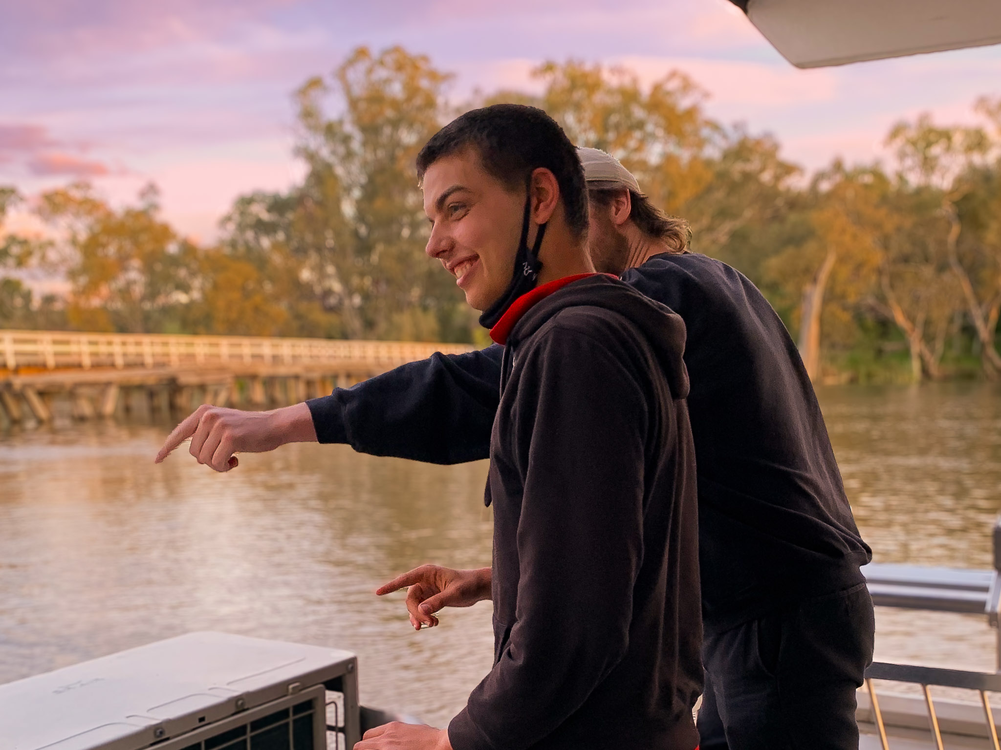 Person looks over river at sunset in Nagambie