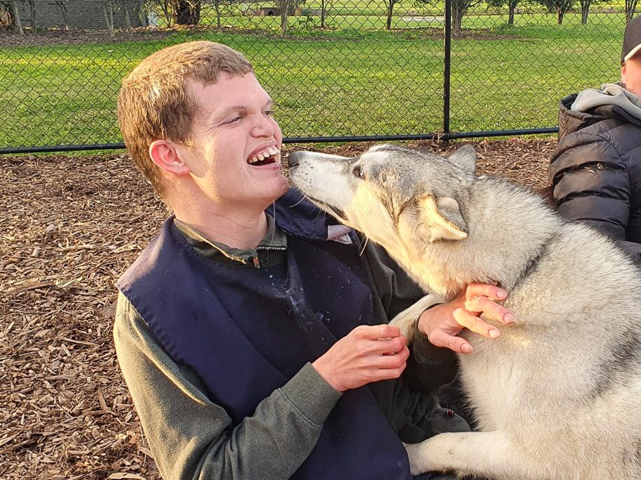 Person with a dog in a dog park