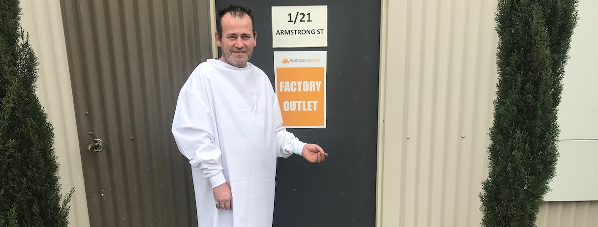 Australian Apparel manager Stephen Long wears the Geelong manufactured PPE gowns